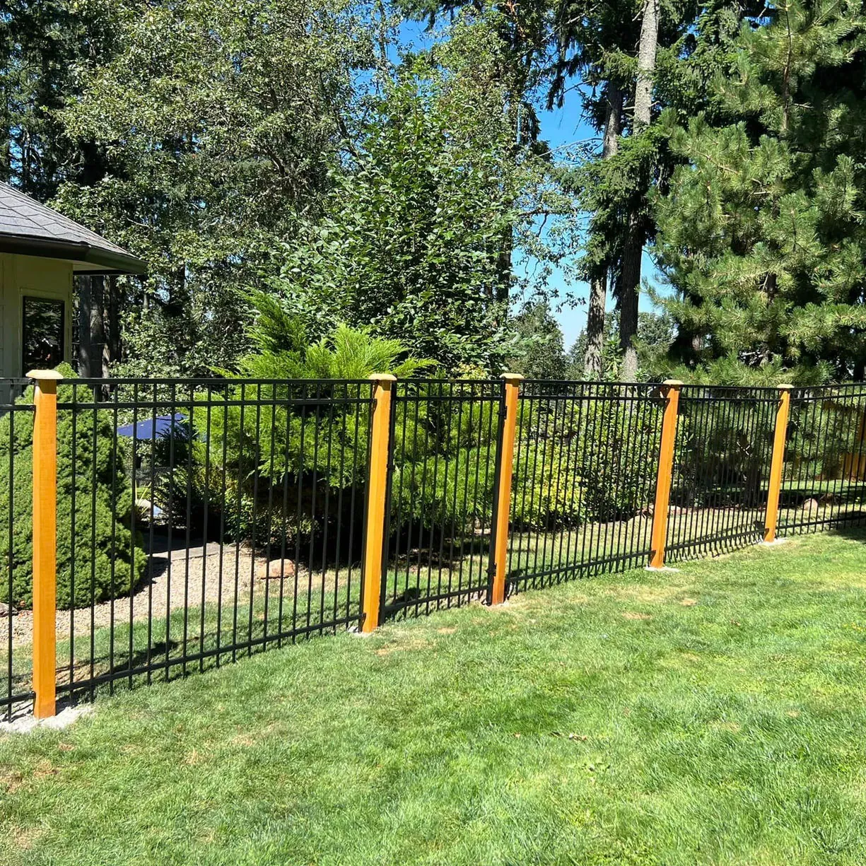 Custom ornamental iron fence installed by Titan Fencing in Eugene, Oregon